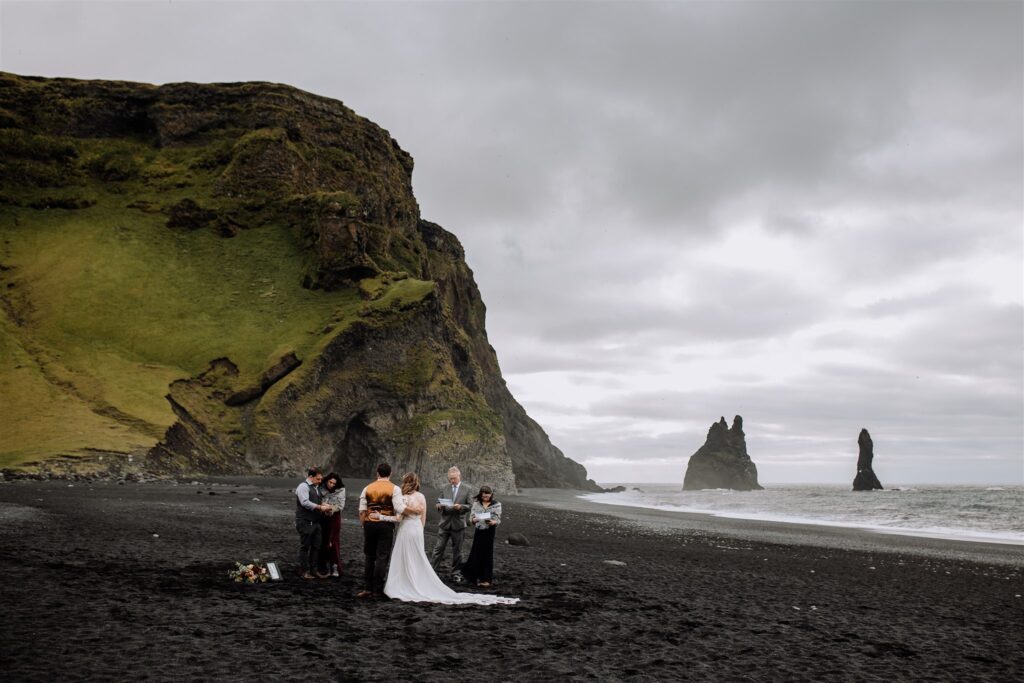 Marshall and Beth's early morning adventure elopement on the black sands of Reynisfjara Beach in Iceland.